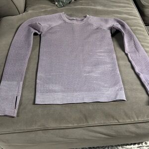 Woman’s lululemon pullover probably a size 4